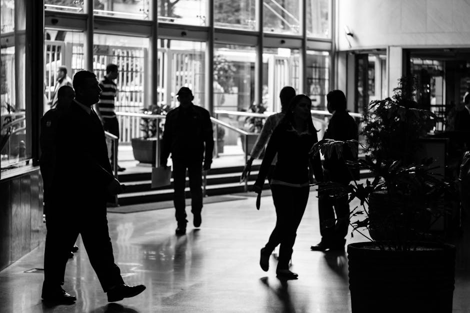 Person walking in Colombian office hallway